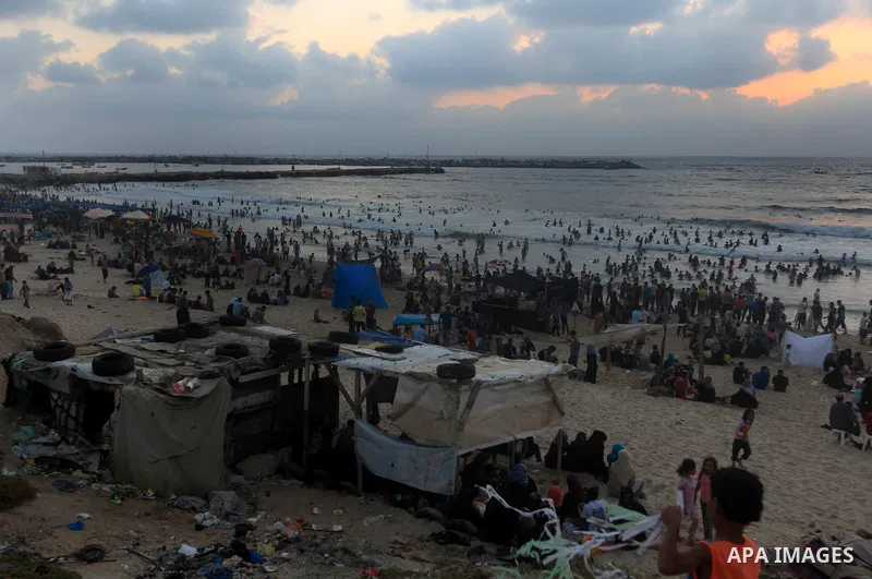 Palestinians enjoy swimming on their week-end in the Mediterranean sea in Gaza City on June 29, 2012. Photo by Majdi Fathi