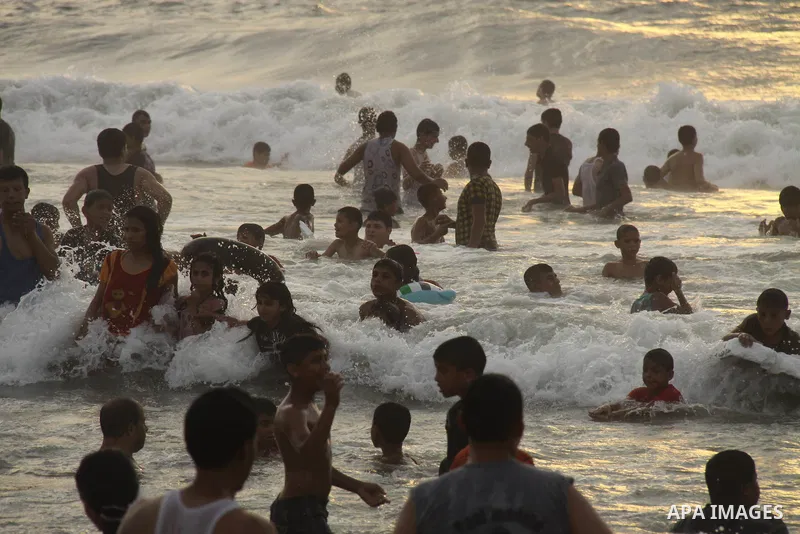 Palestinians enjoy swimming on their week-end in the Mediterranean sea in Gaza City on June 29, 2012. Photo by Majdi Fathi