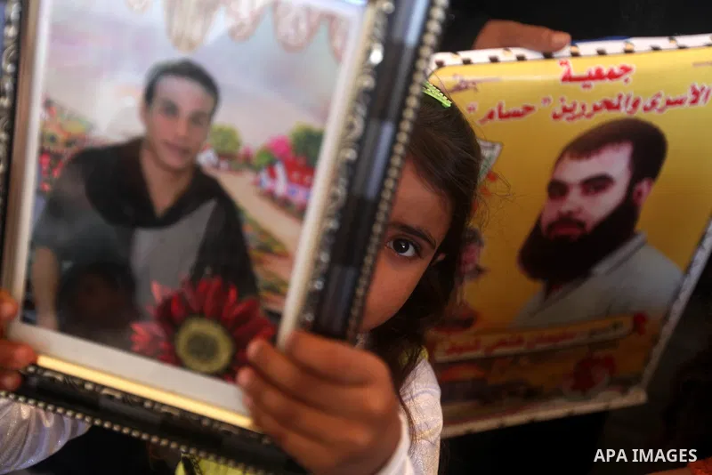 Palestinians gather during a protest in front of the Red Cross' offices in Gaza City to calling of release of palestinian prisoners on July, 02, 2012. Photo by Majdi Fathi
