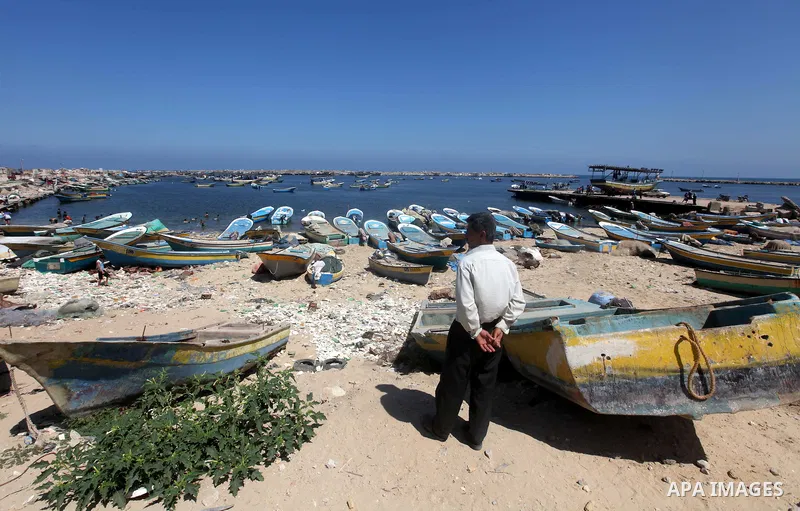 A Palestinian man stands in front of Gaza port on July 02, 2012.The European Union's envoy to the Palestinian Authority confirmed its support and allegiance to the people. Photo by Majdi Fathi