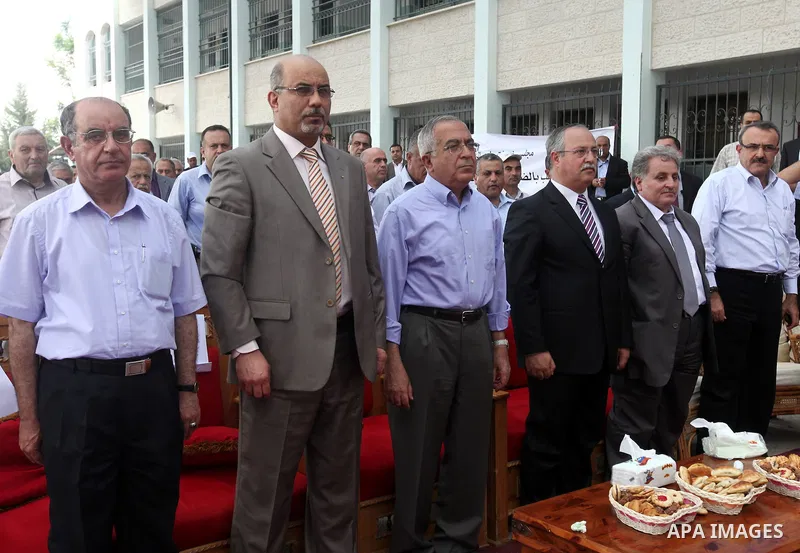 Palestinian Prime Minister Salam Fayyad puts the foundation stone of sanitation regional project in Wad al-Zumar in the West Bank city of Tulkarm on 05 July 2012. Photo by Mustafa Abu Dayeh