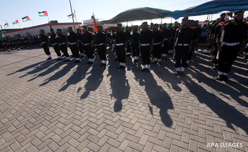 Graduating Hamas's police officers stand to attention during a ceremony in Gaza City on July 05, 2012. Hamas has governed the Gaza Strip since June 2007, after it won a majority of seats in the Palestinian Parliament in...