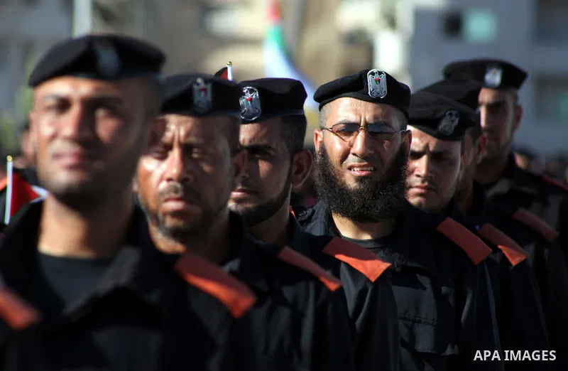 Graduating Hamas's police officers stand to attention during a ceremony in Gaza City on July 05, 2012. Hamas has governed the Gaza Strip since June 2007, after it won a majority of seats in the Palestinian Parliament in...
