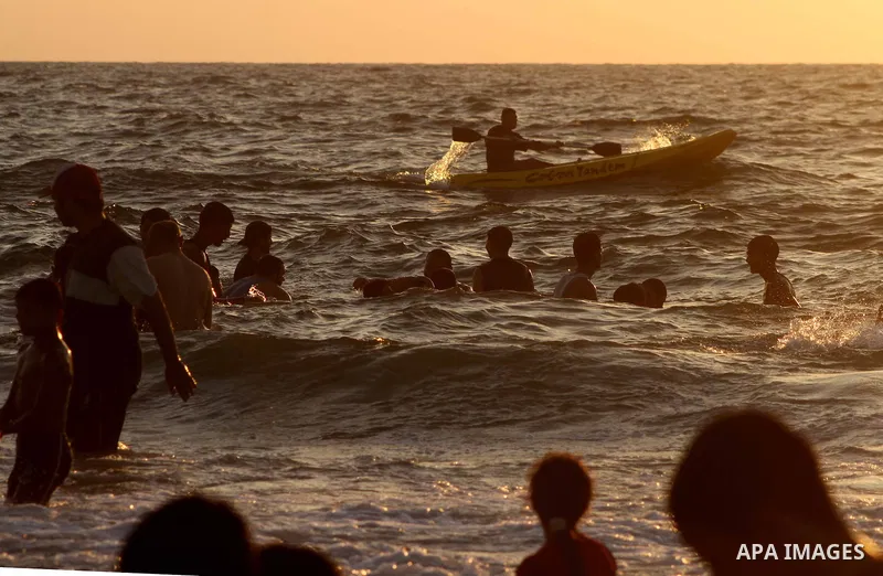 Palestinians enjoy swimming on their week-end in the Mediterranean sea in Gaza City on July 06, 2012. Photo by Ashraf Amra