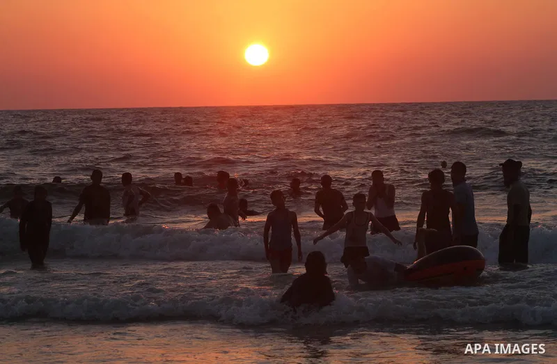Palestinians enjoy swimming on their week-end in the Mediterranean sea in Gaza City on July 06, 2012. Photo by Ashraf Amra