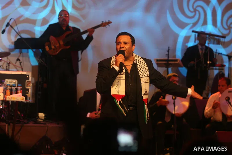 Egyptian singer Mohamed Fouad during a concert at the Palestine International Festival for singing and music in the West Bank city of Ramallah, on July 7, 2012. Photo by Issam Rimawi