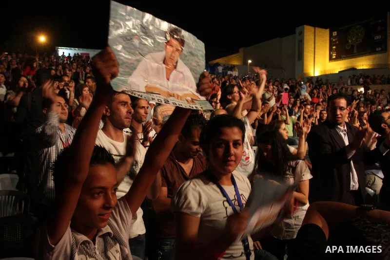 Egyptian singer Mohamed Fouad during a concert at the Palestine International Festival for singing and music in the West Bank city of Ramallah, on July 7, 2012. Photo by Issam Rimawi