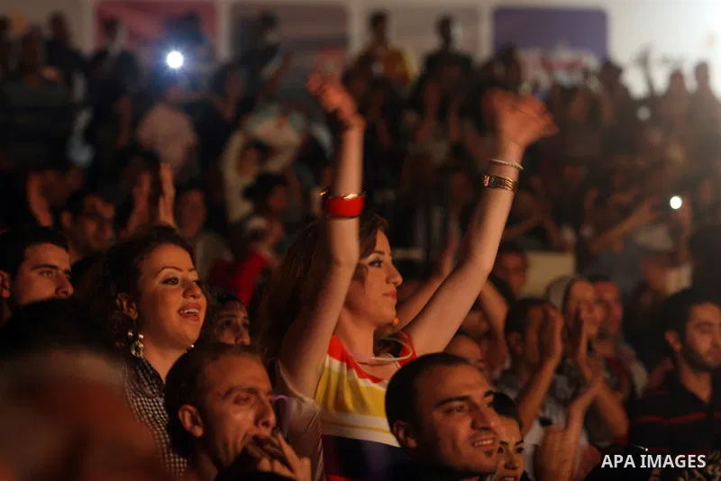 Egyptian singer Mohamed Fouad during a concert at the Palestine International Festival for singing and music in the West Bank city of Ramallah, on July 7, 2012. Photo by Issam Rimawi