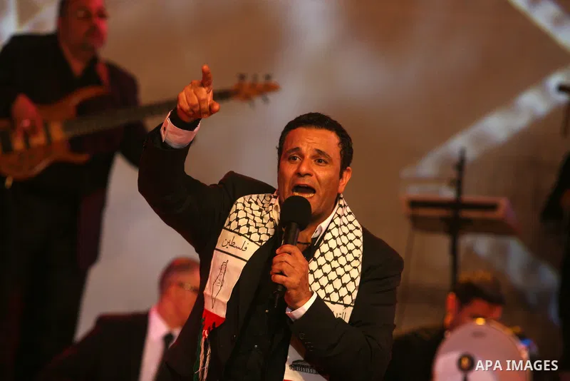 Egyptian singer Mohamed Fouad during a concert at the Palestine International Festival for singing and music in the West Bank city of Ramallah, on July 7, 2012. Photo by Issam Rimawi