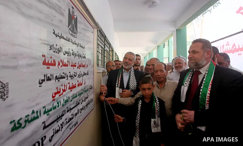 Palestinian Prime Minister in Gaza Ismail Haniyeh attends the opening of a new school in Zaytoon neighborhood Gaza city on 08 July 2012. A Palestinian official says Gaza's prime minister will head to Cairo within the nex...