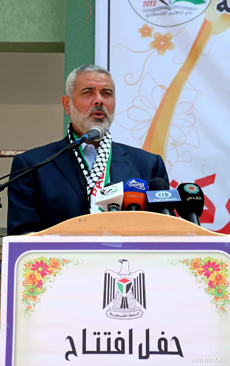 Palestinian Prime Minister in Gaza Ismail Haniyeh speaks during the opening of a new school in Zaytoon neighborhood Gaza city on 08 July 2012. A Palestinian official says Gaza's prime minister will head to Cairo within t...