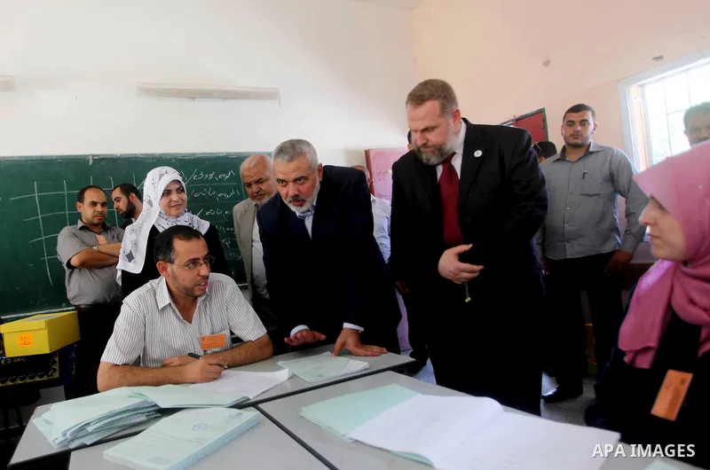 Palestinian Prime Minister in Gaza Ismail Haniyeh attends the opening of a new school in Zaytoon neighborhood Gaza city on 08 July 2012. A Palestinian official says Gaza's prime minister will head to Cairo within the nex...