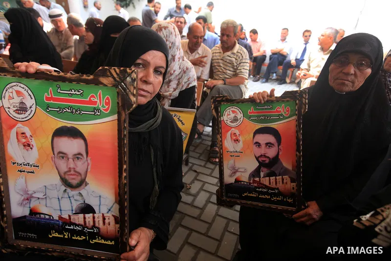 Palestinians gather during a protest in front of the Red Cross' offices in Gaza city calling of release of palestinian prisoners on July, 09, 2012. Photo by Majdi Fathi