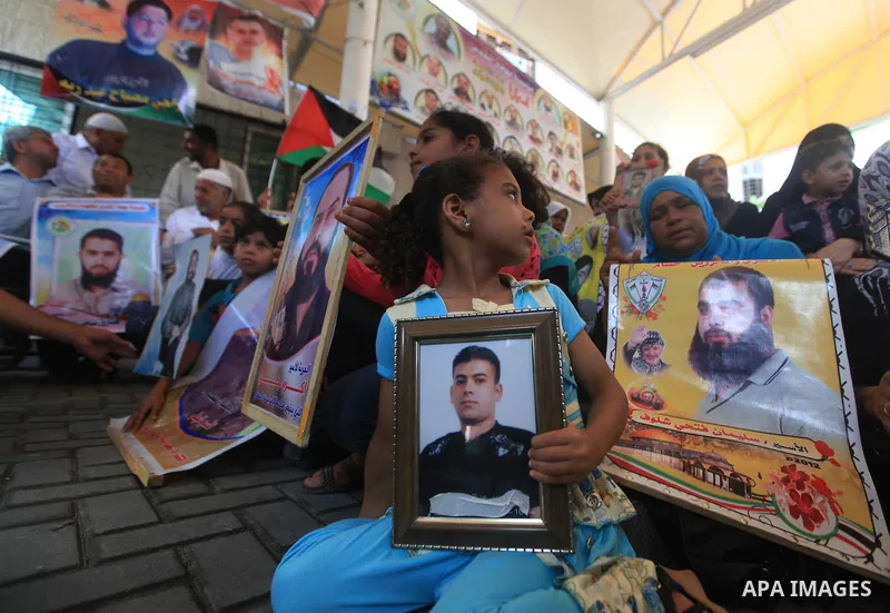 Palestinians gather during a protest in front of the Red Cross' offices in Gaza city calling of release of palestinian prisoners on July, 09, 2012. Photo by Majdi Fathi