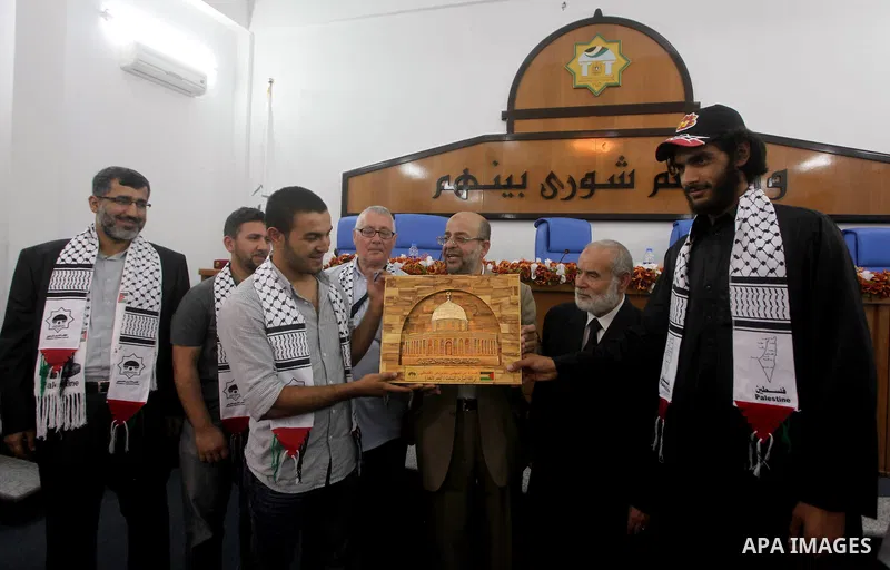 Ahmad Bahar a Hamas leader receives members of "Miles of Smiles 14" aid convoy in Legislative Council in Gaza city on 09 July 2012. Photo by Ashraf Amra