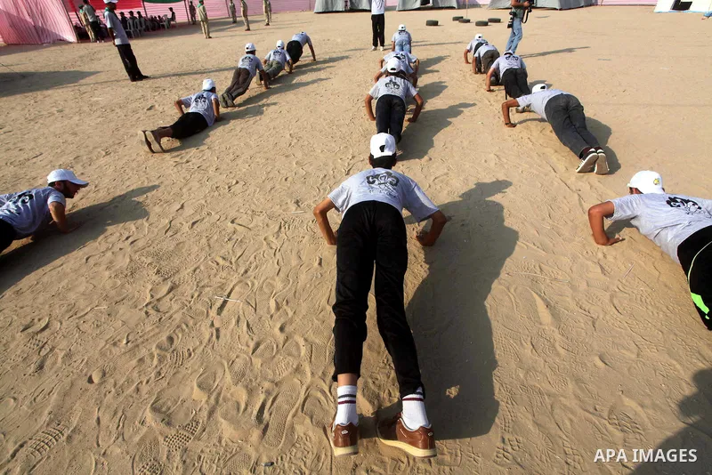 Palestinian children take part in a summer camp organized by Hamas movement at Shati refugee camp in Gaza City July 10, 2012. Hamas movement organized dozens of summer camps for Palestinian children during the period of...