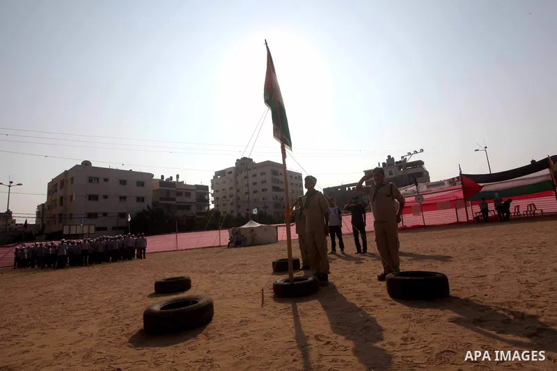 Palestinian children take part in a summer camp organized by Hamas movement at Shati refugee camp in Gaza City July 10, 2012. Hamas movement organized dozens of summer camps for Palestinian children during the period of...
