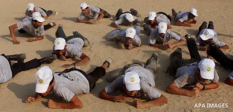 Palestinian children take part in a summer camp organized by Hamas movement at Shati refugee camp in Gaza City July 10, 2012. Hamas movement organized dozens of summer camps for Palestinian children during the period of...