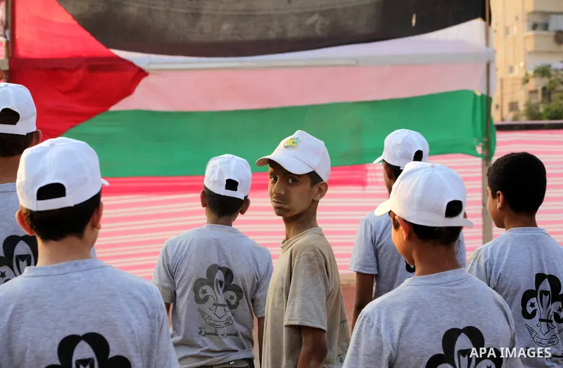 Palestinian children take part in a summer camp organized by Hamas movement at Shati refugee camp in Gaza City July 10, 2012. Hamas movement organized dozens of summer camps for Palestinian children during the period of...