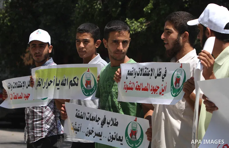 Palestinians take part a protest against political arrests by the security forces in the West Bank, Gaza City on July 11,2012. Photo by Naaman Omar