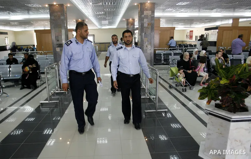 Palestinian Police officers walks at Rafah border crossing between Egypt and Gaza Strip. Islamic Relief provided million for the reconstruction of the Rafah border crossing between Egypt and Gaza, on May 28, 2012. Photo...