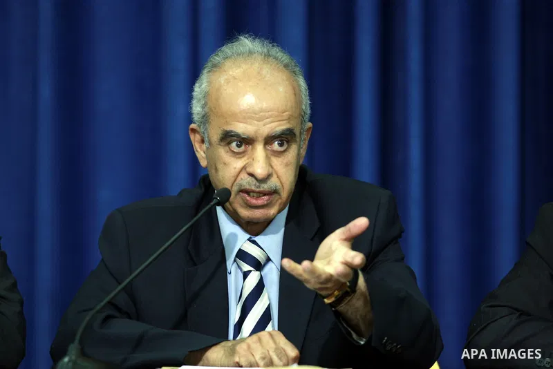 The chairman of the medical commission of Palestinian inquiry commission into the death of late Palestinian leader Yasser Arafat, Abdullah al-Basheer holds a press conference with other Palestinian officials in West Bank...