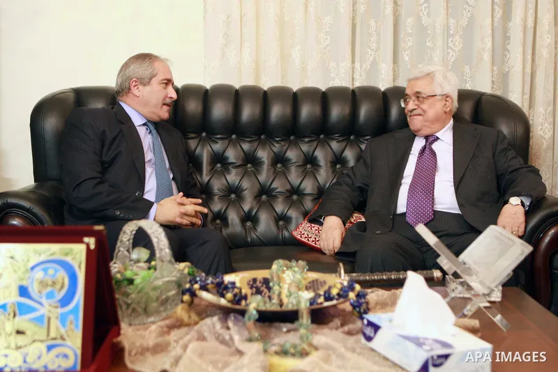 Palestinian President Mahmoud Abbas (Abu Mazen) meets with Jordanian Foreign Minister Nasser Judeh in Amman on 12 July 2012. Photo by Thaer Ganaim