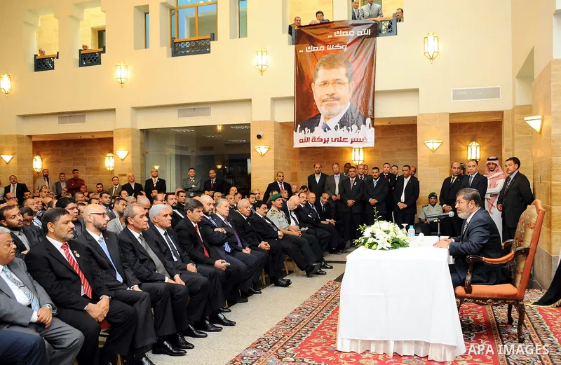Egyptian President Mohamed Morsi meeting with the Egyptian community in Saudi Arabia at the Egyptian consulate in Jeddah, Saudi Arabia, 12 July 2012. Egyptian President Morsi arrived 11 July in Saudi Arabia on his first...