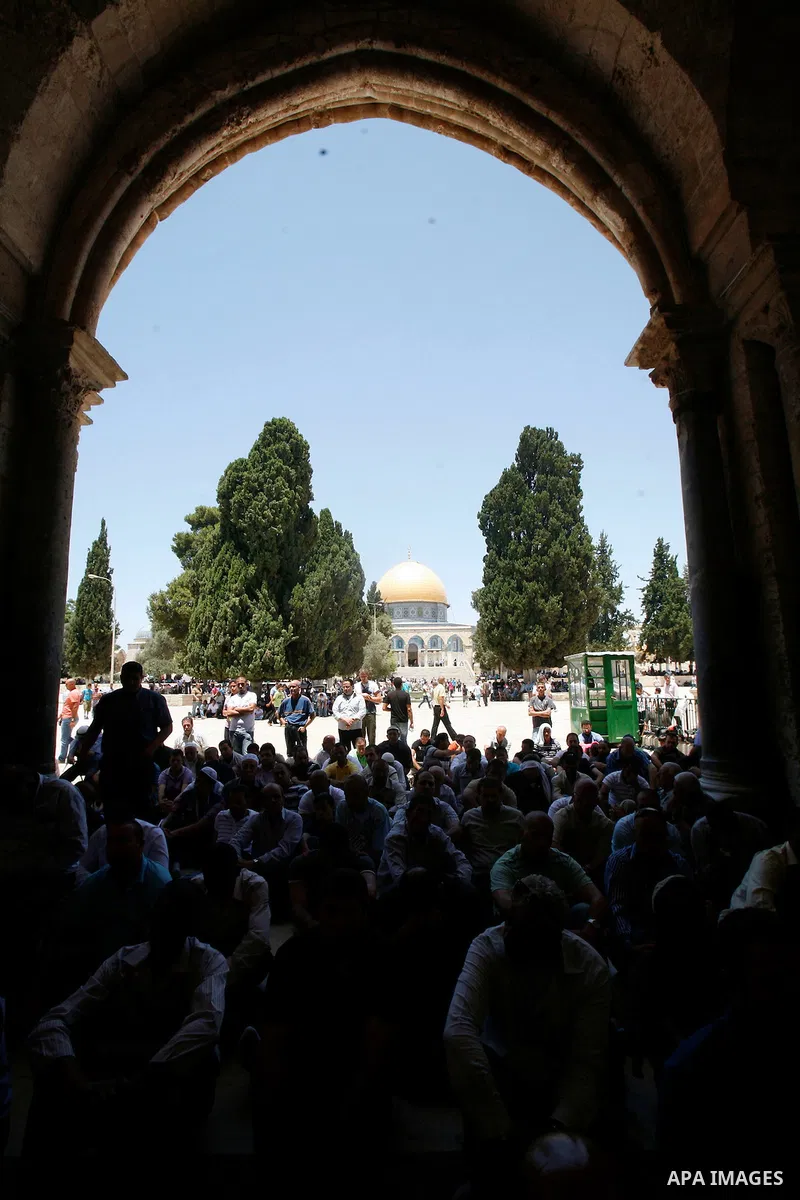 Palestinian Muslim worshippers participate Friday prayers, at the al-Aqsa Mosque compound, in Jerusalem's old city on July 13, 2012. Photo by Mahfouz Abu Turk