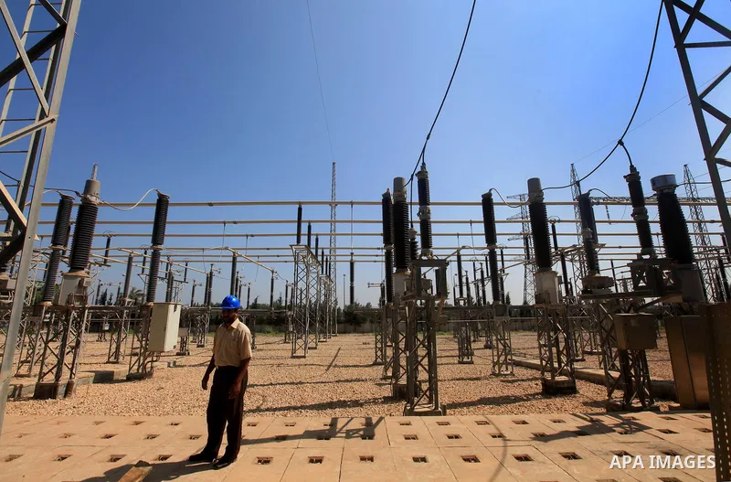 Palestinians workers work in energy company during maintenance work in Gaza city, on July 14, 2012. Photo by Majdi Fathi
