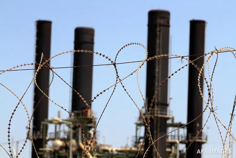 A general view for energy company during maintenance work in Gaza city, on July 14, 2012. Photo by Majdi Fathi