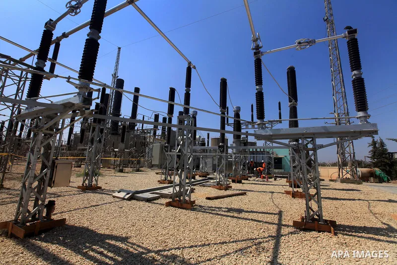 Palestinians workers work in energy company during maintenance work in Gaza city, on July 14, 2012. Photo by Majdi Fathi