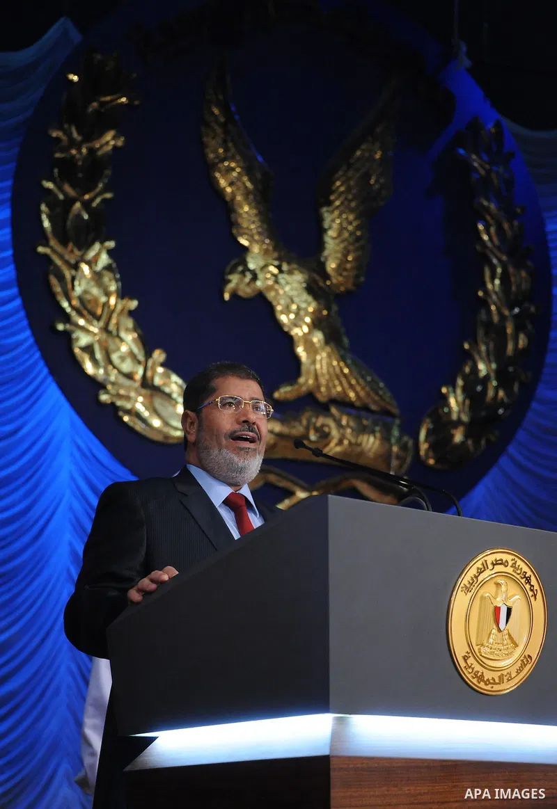 In this image released by the Egyptian Presidency, Egyptian President, Mohammed Morsi at a graduation ceremony at the Police Academy headquarters in Cairo, Egypt, July 14, 2012. The Police Academy was also the venue for...