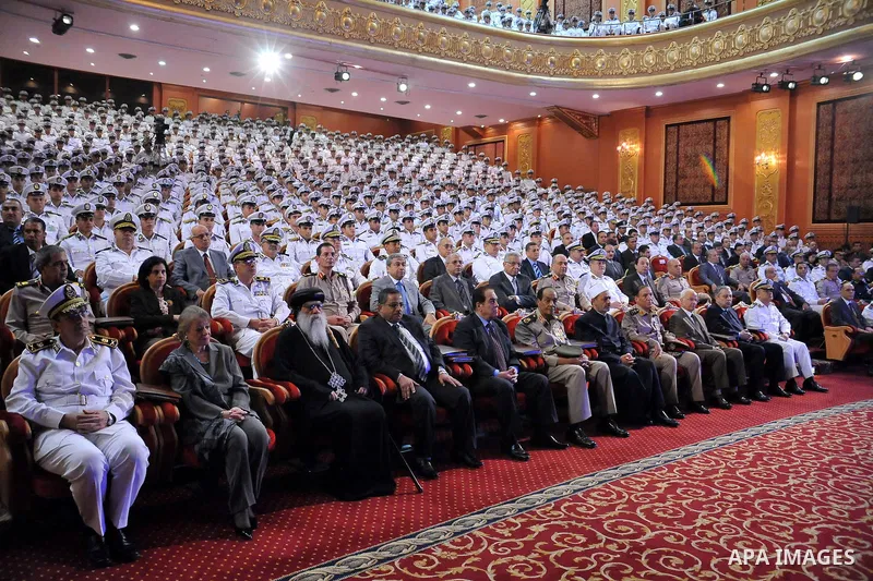 In this image released by the Egyptian Presidency, Egyptian President, Mohammed Morsi at a graduation ceremony at the Police Academy headquarters in Cairo, Egypt, July 14, 2012. The Police Academy was also the venue for...