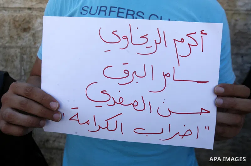 Palestinians take part a protest to calling of release of palestinian prisoners in Israeli jails whose are still refusing food for after a deal was made to end a mass prisoner hunger strike, during a demonstration in the...