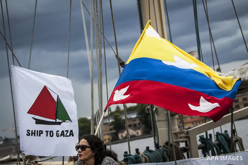 July 13, 2012 - Stockholm, Stockholm, Sweden - A colombian pro-Palestinian supporter at the Skeppsbron port in Stockholm, where the humanitarian aid ship ''Estelle'' is ready to sets sail. The ship is part of a pro-pales...