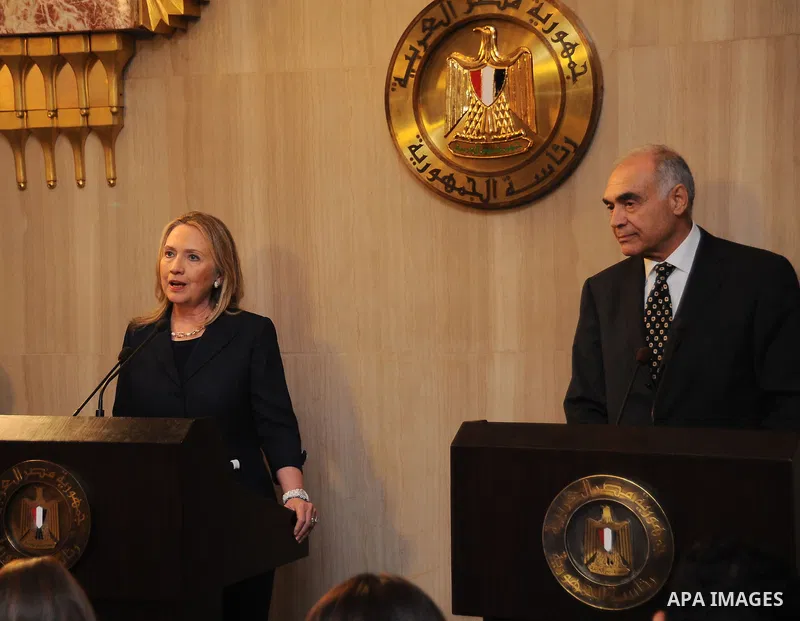 Egyptian Foreign Minister Mohammed Kamel Amr holds a joint press conference with US Secretary of State Hillary Clinton in Cairo on July 14, 2012. Clinton arrived in Cairo for talks with new Egyptian President Mohamed Mor...
