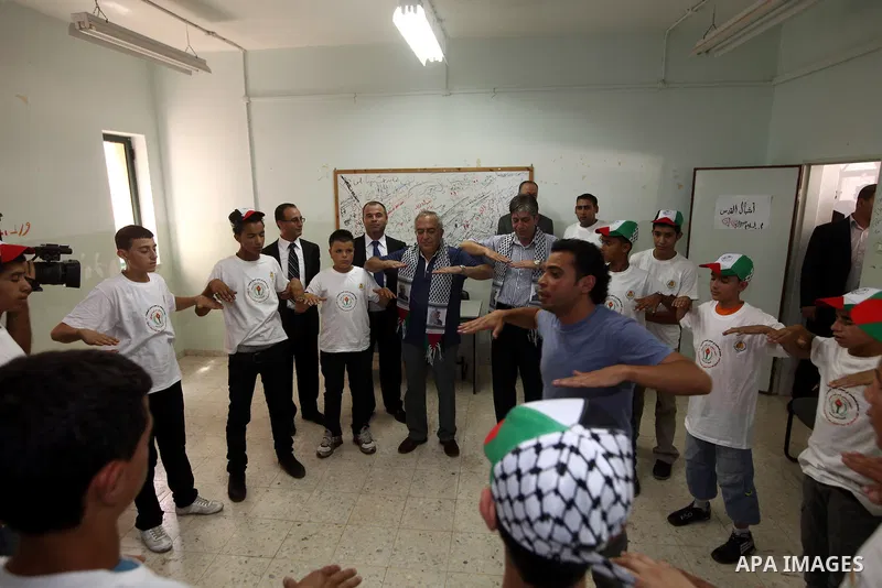 Palestinian Prime Minister Salam Fayyad visits "Palestine in sons of the martyrs eyes" summer camp, in the West Bank city of Jenin, al-Fari'ah refugee camp, on July 15, 2012. Photo by Mustafa Abu Dayeh