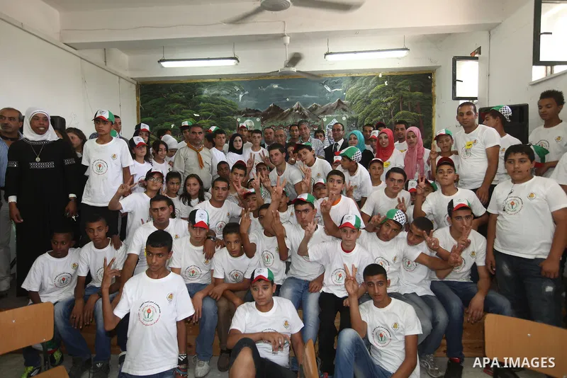 Palestinian Prime Minister Salam Fayyad visits "Palestine in sons of the martyrs eyes" summer camp, in the West Bank city of Jenin, al-Fari'ah refugee camp, on July 15, 2012. Photo by Mustafa Abu Dayeh