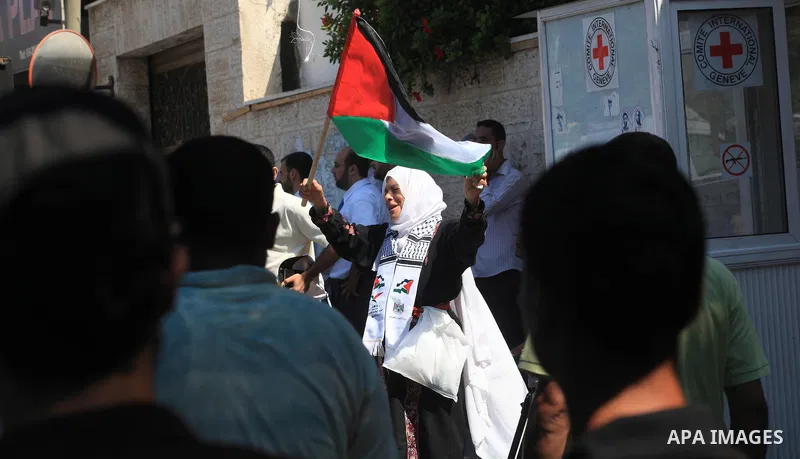 Palestinian relatives prisoners attend a protest calling for the release of their sons held in Israeli jails in front of the headquarters Red Cross in Gaza City, on July.16, 2012. Photo by Majdi Fathi