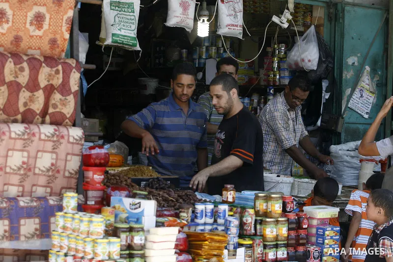 A Palestinian vendor displays foodstuff in preparation for the holy month of Ramadan in the Rafah refugee camp in the southern Gaza Strip on July 17, 2012 . Islam's holy month of Ramadan will begin in few days depending...