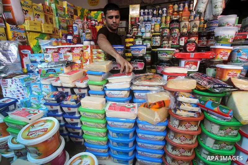 A Palestinian vendor displays goods in preparation for the holy month of Ramadan in the Gaza city on July 17, 2012 . Islam's holy month of Ramadan will begin in few days depending on the sighting of the crescent moon. Mu...