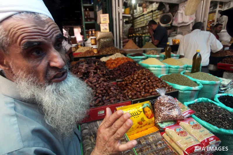 A Palestinian vendor displays goods in preparation for the holy month of Ramadan in the Gaza city on July 17, 2012 . Islam's holy month of Ramadan will begin in few days depending on the sighting of the crescent moon. Mu...