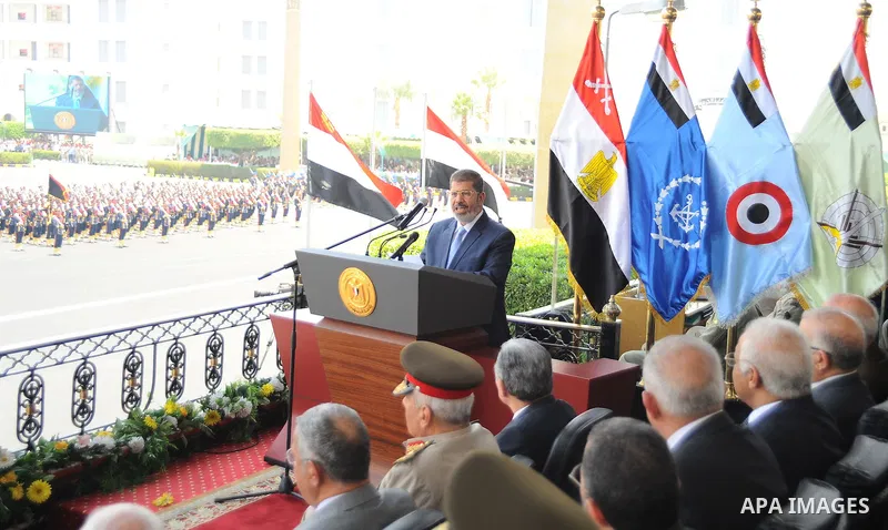 Egypt's Islamist President Mohamed Mursi speaks during a medal ceremony for graduates at the Egyptian Military Academy in Cairo July 17, 2012. Fadi Fares / Egyptian Presidency