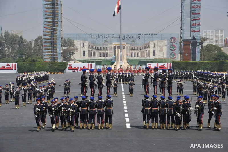 Egyptian troops demonstrate their skills at a graduation ceremony attended by President Mohammed Morsi, unseen, in Cairo, Egypt, Tuesday, July 17, 2012. Egypt's President Mohammed Morsi hailed the Egyptian army and its c...