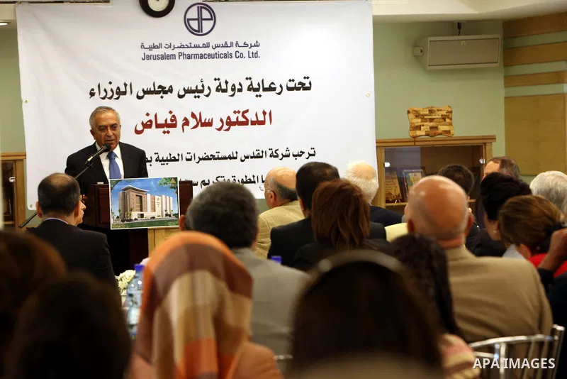 Palestinian Prime Minister Salam Fayyad during the opening new sections in Al-Quds company for medical products, in the West Bank city of Ramallah. on 18 July 2012. Photo by Mustafa Abu Dayeh