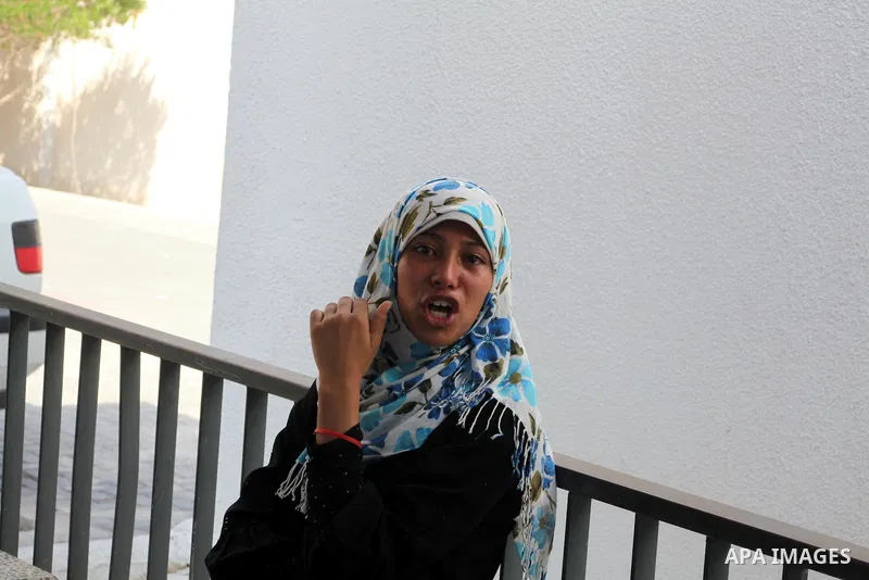 Palestinian secondary school student crying after find their results in Gaza city on July 19, 2012. The Ministry of Education in Gaza Strip and the West Bank announced the results together. Photo by Ashraf Amra