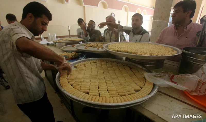 Palestinian vendors sell sweets after the results of high school exams, or "Tawjihi", in Gaza city on July 19, 2012. Photo by Ashraf Amra