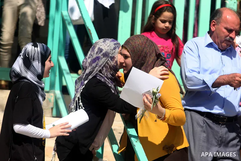 Palestinian high school student celebrated after hearing the results of their final exams known as "Tawjihi" in the West Bank city of Ramallah on July 19, 2012. The Ministry of Education in Gaza Strip and the West Bank a...