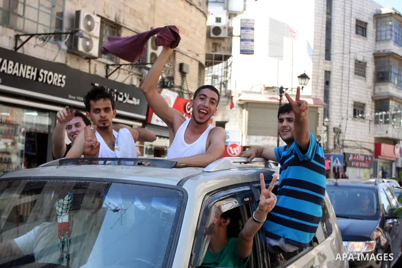 Palestinian high school student celebrated after hearing the results of their final exams known as "Tawjihi" in the West Bank city of Ramallah on July 19, 2012. The Ministry of Education in Gaza Strip and the West Bank a...